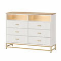 Cassettiera rettangolare a 6 cassetti in MDF bianco 140 x 40 x 80 cm con vani aperti luce LED piano effetto rovere e base in acciaio dorato
